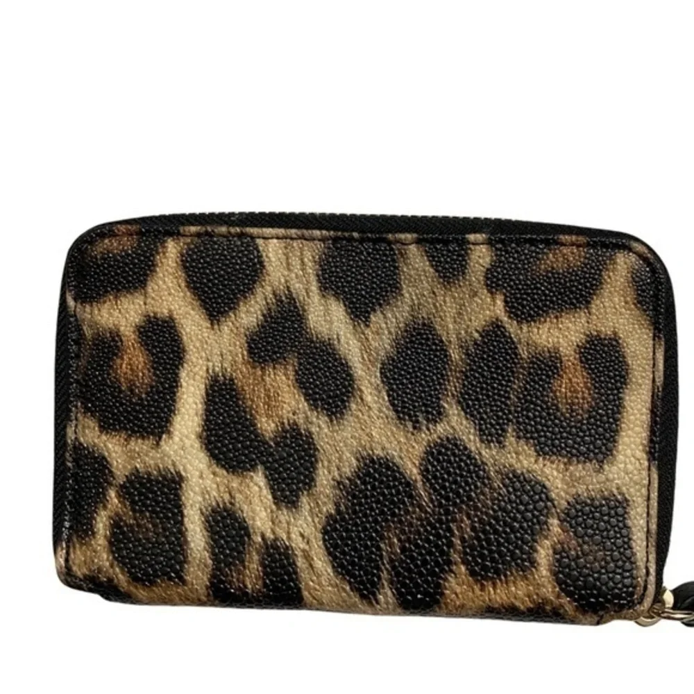 Kate spade black gold animal print wristlet